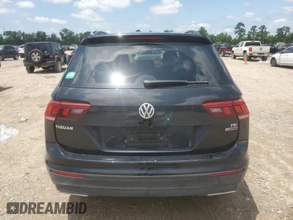 ✅ 2018 Volkswagen Tiguan S • VIN: 3VV0B7AX2JM114189 • Lot: 56109665. Listed on Copart with 65,432 mi. Free auction sales archive from the USA and detailed vehicle history report at DreamBid. Image 6.