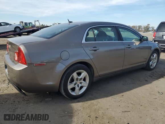 ✅ 2010 Chevrolet Malibu 1LS • VIN: 1G1ZB5EB2AF103775 • Lot: 77517804. Listed on Copart with 152,396 mi. Free auction sales archive from the USA and detailed vehicle history report at DreamBid. Image 3.