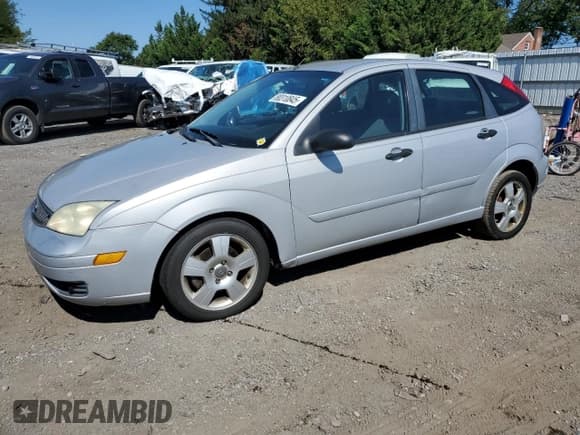 ✅ 2005 Ford Focus S • VIN: 3FAFP37N45R143071 • Лот: 80310845. Опубликован ранее на Copart с пробегом 203 163 миль. Бесплатный доступ к архиву аукционных продаж из США и подробный отчёт об истории автомобиля на DreamBid. Изображение 1.