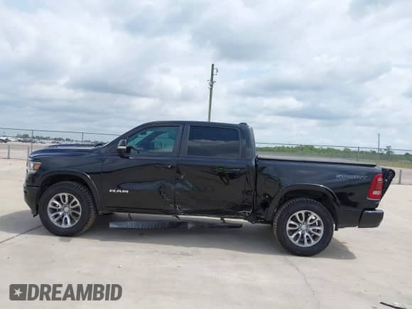 2020 Ram 1500 Laramie with VIN 1C6RREJT2LN295149, listed as a IAAI auction lot 42411146 with 113,445 mi miles and . Bid and sale history available at DreamBid. Image 14.