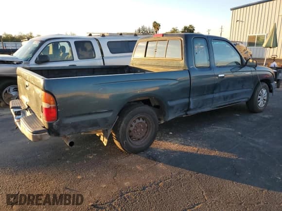 ✅ 1998 Toyota Tacoma • VIN: 4TAVL52N8WZ070705 • Лот: 93143405. Опубликован ранее на Copart с пробегом 254 411 миль. Бесплатный доступ к архиву аукционных продаж из США и подробный отчёт об истории автомобиля на DreamBid. Изображение 3.