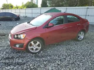 2014 Chevrolet Sonic LTZ with VIN 1G1JE5SB5E4232734, listed as a Copart auction lot 61574285 with Not provided miles and Salvage title. Bid and sale history available at DreamBid. Image 1.