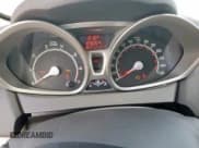 ✅ 2013 Ford Fiesta SE • VIN: 3FADP4EJXDM118880 • Lot: 82126065. Wystawiony na Copart z przebiegiem 147 015 mil. Bezpłatny archiwum sprzedaży aukcyjnych z USA i szczegółowy raport historii pojazdu na DreamBid. Zdjęcie 9.