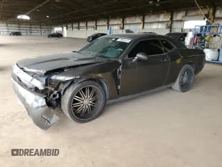 ✅ 2009 Dodge Challenger SE • VIN: 2B3LJ44V79H522769 • Lot: 49964414. Wystawiony na Copart z przebiegiem 193 953 mil. Bezpłatny archiwum sprzedaży aukcyjnych z USA i szczegółowy raport historii pojazdu na DreamBid. Zdjęcie 1.