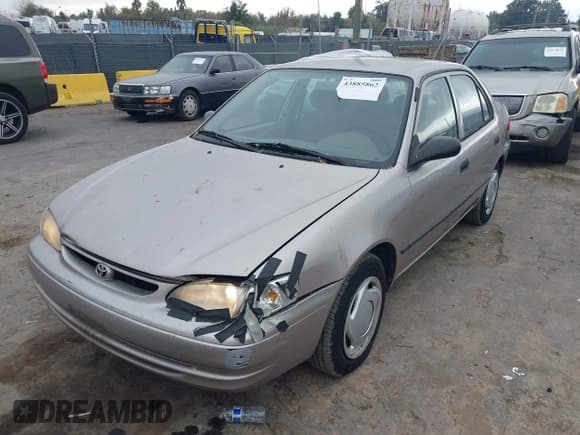 ✅ 1998 Toyota Corolla CE • VIN: 1NXBR12E7WZ076552 • Lot: 43885862. Listed on IAAI with 153,374 mi. Free auction sales archive from the USA and detailed vehicle history report at DreamBid. Image 6.
