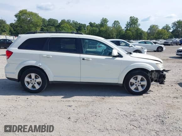 2012 Dodge Journey SXT с VIN 3C4PDCBG5CT393466, выставлен на аукционе IAAI как лот 43175067 с пробегом 164 793 миль миль и . История ставок и продаж доступна на DreamBid. Изображение 13.