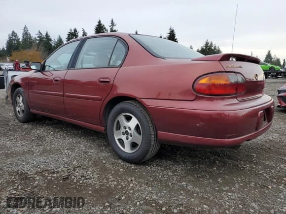 ✅ 2003 Chevrolet Malibu LS • VIN: 1G1NE52J13M662444 • Lot: 90954445. Listed on Copart with 95,358 mi. Free auction sales archive from the USA and detailed vehicle history report at DreamBid. Image 2.