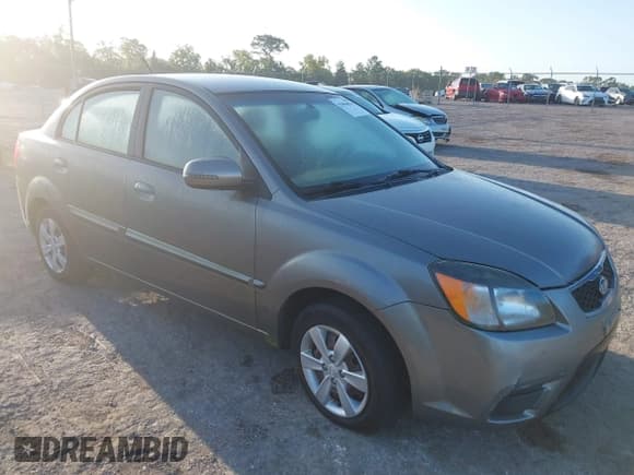 ✅ 2011 Kia Rio LX • VIN: KNADH4A37B6923356 • Lot: 42006874. Wystawiony na IAAI z przebiegiem 116 462 mil. Bezpłatny archiwum sprzedaży aukcyjnych z USA i szczegółowy raport historii pojazdu na DreamBid. Zdjęcie 1.