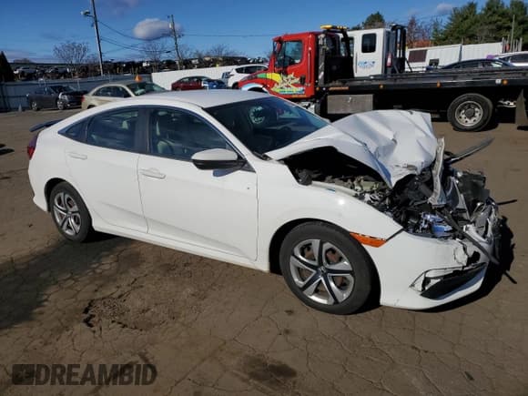 ✅ 2016 Honda Civic LX • VIN: 2HGFC2F56GH510618 • Lot: 92568485. Listed on Copart with 101,411 mi. Free auction sales archive from the USA and detailed vehicle history report at DreamBid. Image 4.