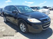 ✅ 2011 Mazda CX-9 Sport • VIN: JM3TB3BV0B0305591 • Lot: 42318877. Listed on IAAI with Not provided. Free auction sales archive from the USA and detailed vehicle history report at DreamBid. Image 1.