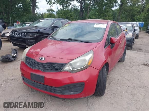 ✅ 2012 Kia Rio LX • VIN: KNADM4A32C6058955 • Лот: 43054229. Опубликован ранее на IAAI с пробегом 156 327 миль. Бесплатный доступ к архиву аукционных продаж из США и подробный отчёт об истории автомобиля на DreamBid. Изображение 2.