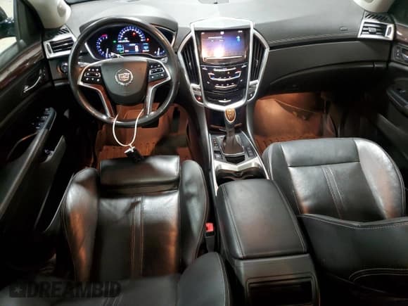 ✅ 2014 Cadillac SRX Performance Collection • VIN: 3GYFNFE38ES518630 • Lot: 64669435. Wystawiony na Copart z przebiegiem 161 404 mil. Bezpłatny archiwum sprzedaży aukcyjnych z USA i szczegółowy raport historii pojazdu na DreamBid. Zdjęcie 8.