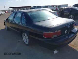 1994 Chevrolet Caprice 1SA Special Value z VIN 1G1BL52P5RR149027, wystawiony jako IAAI lot #42433643 z przebiegiem Nie podano mil oraz . Historia ofert i sprzedaży dostępna na DreamBid. Obrazek 3.