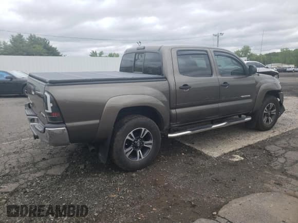 ✅ 2013 Toyota Tacoma • VIN: 3TMLU4EN4DM124465 • Lot: 58167135. Listed on Copart with 116,098 mi. Free auction sales archive from the USA and detailed vehicle history report at DreamBid. Image 3.