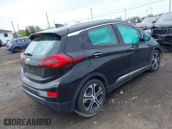 ✅ 2021 Chevrolet Bolt EV Premier • VIN: 1G1FZ6S04M4107625 • Lot: 42148864. Listed on IAAI with 28,348 mi. Free auction sales archive from the USA and detailed vehicle history report at DreamBid. Image 4.