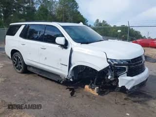 2023 Chevrolet Tahoe RST z VIN 1GNSKRKD2PR410464, wystawiony jako IAAI lot #43336461 z przebiegiem 31 732 mil mil oraz . Historia ofert i sprzedaży dostępna na DreamBid. Obrazek 1.