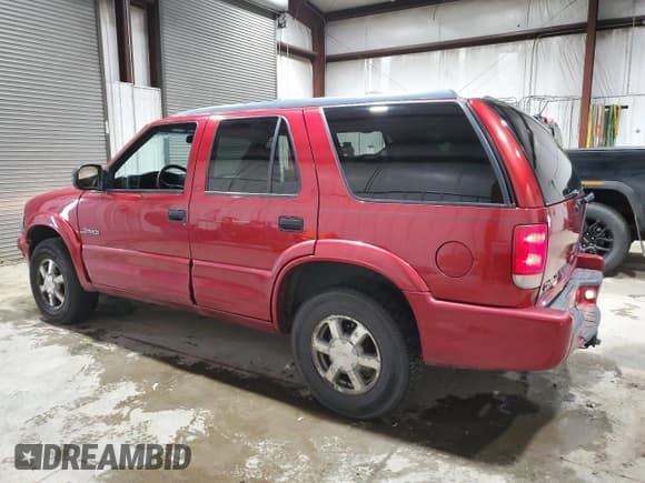 ✅ 2000 Oldsmobile Bravada • VIN: 1GHDT13W6Y2404218 • Лот: 49784485. Опубликован ранее на Copart с пробегом 128 841 миль. Бесплатный доступ к архиву аукционных продаж из США и подробный отчёт об истории автомобиля на DreamBid. Изображение 2.