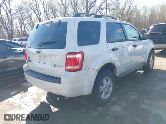 ✅ 2011 Ford Escape Hybrid • VIN: 1FMCU4K37BKC68370 • Lot: 41895193. Wystawiony na IAAI z przebiegiem 220 321 mil. Bezpłatny archiwum sprzedaży aukcyjnych z USA i szczegółowy raport historii pojazdu na DreamBid. Zdjęcie 4.