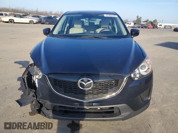 ✅ 2015 Mazda CX-5 Sport • VIN: JM3KE2BE6F0491107 • Lot: 42462395. Listed on Copart with 82,528 mi. Free auction sales archive from the USA and detailed vehicle history report at DreamBid. Image 5.