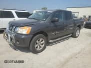 ✅ 2012 Nissan Titan SV • VIN: 1N6AA0EJ4CN320946 • Lot: 71002775. Listed on Copart with 127,819 mi. Free auction sales archive from the USA and detailed vehicle history report at DreamBid. Image 1.