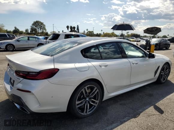✅ 2023 BMW 8 Series 840i • VIN: WBAGV4C01PCL65666 • Lot: 47543754. Listed on Copart with 31,703 mi. Free auction sales archive from the USA and detailed vehicle history report at DreamBid. Image 3.