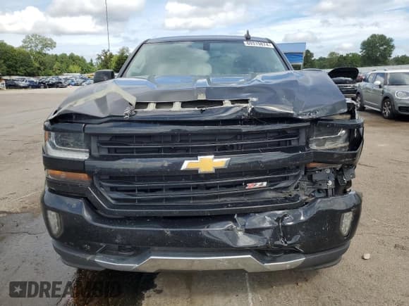 ✅ 2018 Chevrolet Silverado 1500 LT • VIN: 3GCUKREC7JG571095 • Лот: 69319874. Опубликован ранее на Copart с пробегом 159 306 миль. Бесплатный доступ к архиву аукционных продаж из США и подробный отчёт об истории автомобиля на DreamBid. Изображение 5.