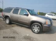 ✅ 2011 GMC Yukon XL SLT • VIN: 1GKS2KE37BR128062 • Лот: 71705225. Опубликован ранее на Copart с пробегом 203 514 миль. Бесплатный доступ к архиву аукционных продаж из США и подробный отчёт об истории автомобиля на DreamBid. Изображение 4.