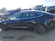 ✅ 2020 Tesla Model 3 Performance • VIN: 5YJ3E1EC7LF741937 • Lot: 43741182. Listed on IAAI with 60,739 mi. Free auction sales archive from the USA and detailed vehicle history report at DreamBid. Image 13.