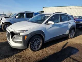 ✅ 2018 Hyundai Kona SEL • VIN: KM8K22AA0JU088656 • Лот: 77535684. Опубликован ранее на Copart с пробегом 100 988 миль. Бесплатный доступ к архиву аукционных продаж из США и подробный отчёт об истории автомобиля на DreamBid. Изображение 1.