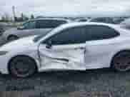 2023 Toyota Camry SE with VIN 4T1G11BKXPU103277, listed as a IAAI auction lot 41978396 with 66,624 mi miles and . Bid and sale history available at DreamBid. Image 6.