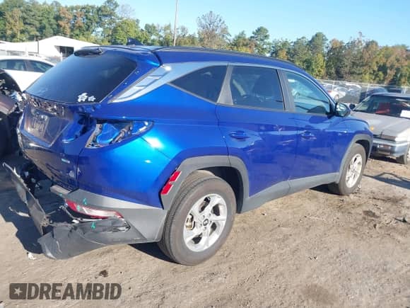 2024 Hyundai Tucson SEL with VIN 5NMJBCDE5RH364255, listed as a IAAI auction lot 43409904 with 38,715 mi miles and . Bid and sale history available at DreamBid. Image 4.