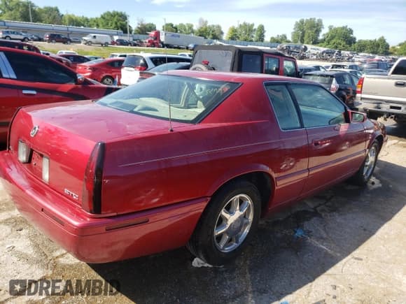 ✅ 2000 Cadillac Eldorado Touring ETC • VIN: 1G6ET129XYU191433 • Lot: 58108224. Listed on Copart with 76,957 mi. Free auction sales archive from the USA and detailed vehicle history report at DreamBid. Image 3.