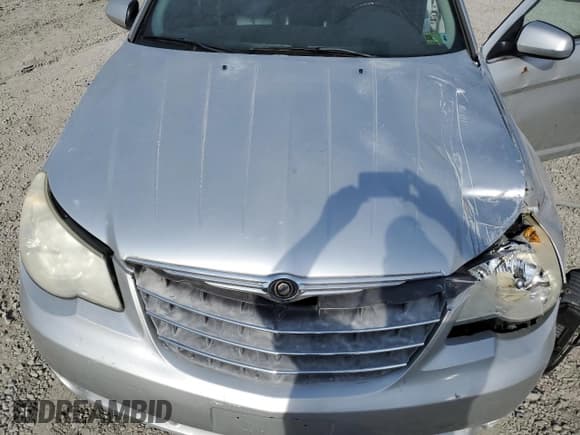 ✅ 2009 Chrysler Sebring Touring • VIN: 1C3LC56B99N566592 • Lot: 47864895. Wystawiony na Copart z przebiegiem 191 677 mil. Bezpłatny archiwum sprzedaży aukcyjnych z USA i szczegółowy raport historii pojazdu na DreamBid. Zdjęcie 11.