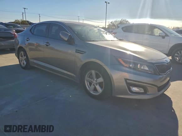✅ 2015 Kia Optima LX • VIN: 5XXGM4A77FG466439 • Lot: 94572025. Listed on Copart with 128,472 mi. Free auction sales archive from the USA and detailed vehicle history report at DreamBid. Image 4.
