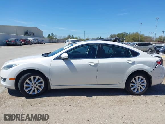 ✅ 2012 Mazda 6 i Touring Plus • VIN: 1YVHZ8EHXC5M21957 • Лот: 41774460. Опубликован ранее на IAAI с пробегом 140 093 миль. Бесплатный доступ к архиву аукционных продаж из США и подробный отчёт об истории автомобиля на DreamBid. Изображение 14.