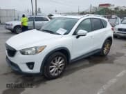 ✅ 2014 Mazda CX-5 Grand Touring • VIN: JM3KE2DY2E0390426 • Лот: 42509316. Опубликован ранее на IAAI с пробегом 183 062 миль. Бесплатный доступ к архиву аукционных продаж из США и подробный отчёт об истории автомобиля на DreamBid. Изображение 2.