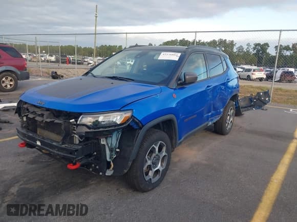 ✅ 2022 Jeep Compass Trailhawk • VIN: 3C4NJDDB4NT157014 • Lot: 43376803. Listed on IAAI with 148,332 mi. Free auction sales archive from the USA and detailed vehicle history report at DreamBid. Image 18.