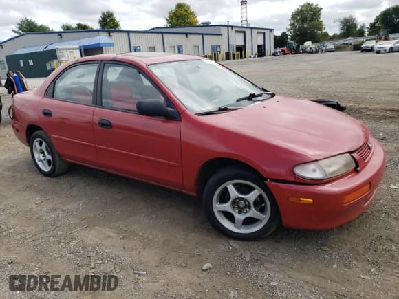 ✅ 1995 Mazda Protege • VIN: JM1BA1413S0173593 • Лот: 68877974. Опубликован ранее на Copart с пробегом 133 411 миль. Бесплатный доступ к архиву аукционных продаж из США и подробный отчёт об истории автомобиля на DreamBid. Изображение 4.