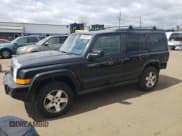 ✅ 2009 Jeep Commander Sport • VIN: 1J8HG48K39C554570 • Lot: 52667825. Listed on Copart with 194,886 mi. Free auction sales archive from the USA and detailed vehicle history report at DreamBid. Image 1.