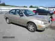 2002 Hyundai Elantra GLS z VIN KMHDN45D42U421622, wystawiony jako Copart lot #75853664 z przebiegiem 57 595 mil mil oraz Czysty tytuł • Clean title. Historia ofert i sprzedaży dostępna na DreamBid. Obrazek 4.