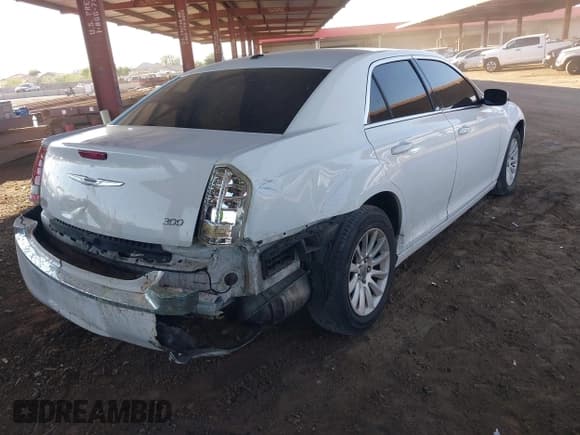 ✅ 2014 Chrysler 300 • VIN: 2C3CCAAG2EH199923 • Лот: 43587502. Опубликован ранее на IAAI с пробегом 150 190 миль. Бесплатный доступ к архиву аукционных продаж из США и подробный отчёт об истории автомобиля на DreamBid. Изображение 4.