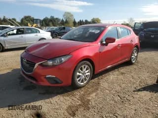 ✅ 2014 Mazda 3 i Touring • VIN: JM1BM1L78E1149477 • Lot: 86716635. Listed on Copart with 52,640 mi. Free auction sales archive from the USA and detailed vehicle history report at DreamBid. Image 1.