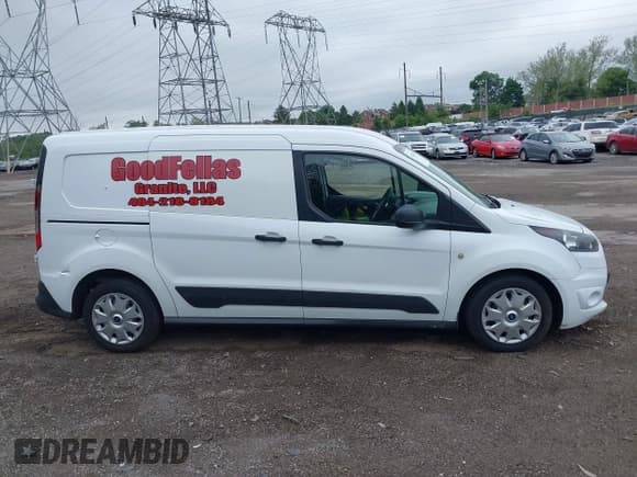 ✅ 2015 Ford Transit Connect XLT • VIN: NM0LS7FX2F1175984 • Lot: 42145335. Listed on IAAI with 143,802 mi. Free auction sales archive from the USA and detailed vehicle history report at DreamBid. Image 14.