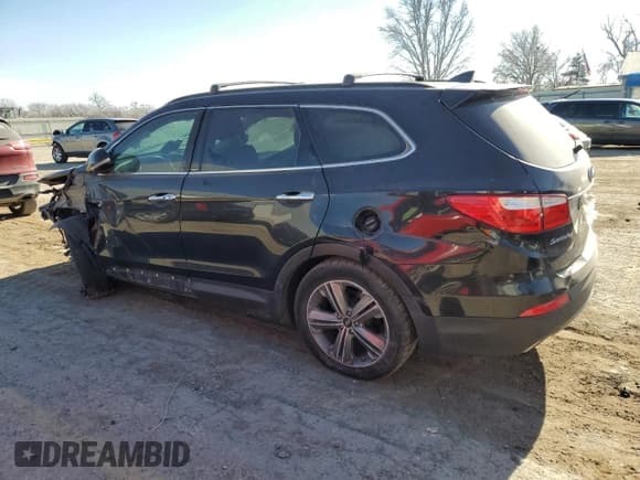 ✅ 2015 Hyundai Santa Fe Limited • VIN: KM8SN4HF9FU128325 • Лот: 87370584. Опубликован ранее на Copart с пробегом Не указан. Бесплатный доступ к архиву аукционных продаж из США и подробный отчёт об истории автомобиля на DreamBid. Изображение 2.