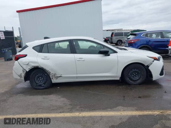 2024 Subaru Impreza with VIN JF1GUABC2R8354784, listed as a IAAI auction lot 43414933 with 26,138 mi miles and . Bid and sale history available at DreamBid. Image 14.