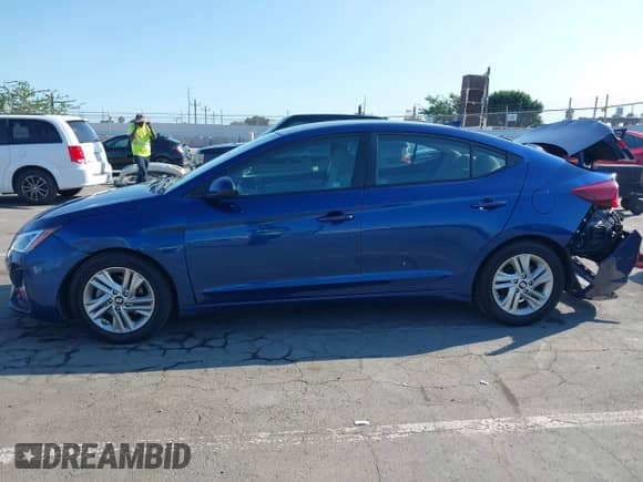 2019 Hyundai Elantra SEL z VIN 5NPD84LF7KH434634, wystawiony jako IAAI lot #43200937 z przebiegiem 76 488 mil mil oraz . Historia ofert i sprzedaży dostępna na DreamBid. Obrazek 14.