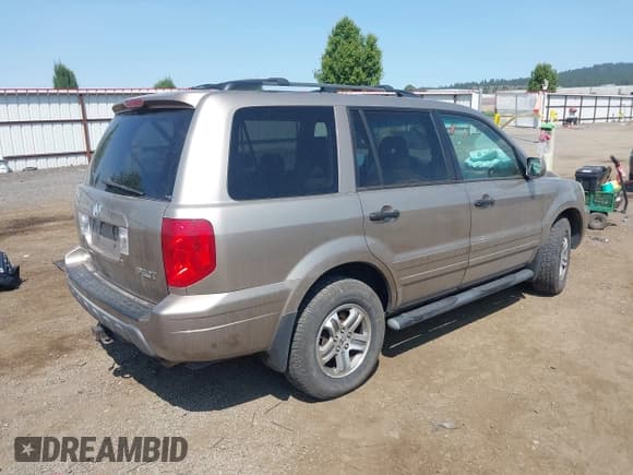 ✅ 2003 Honda Pilot EX • VIN: 2HKYF18653H598920 • Lot: 42426339. Listed on IAAI with 274,455 mi. Free auction sales archive from the USA and detailed vehicle history report at DreamBid. Image 4.