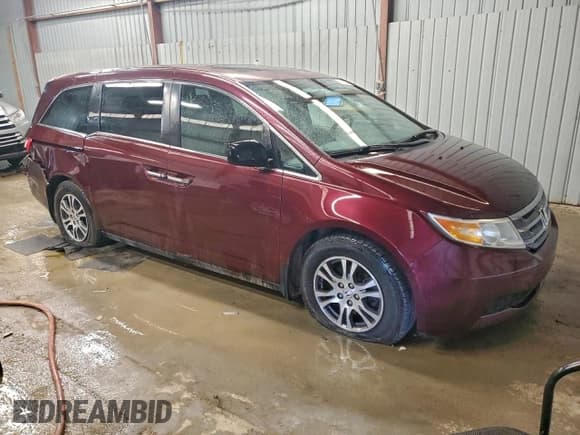 ✅ 2013 Honda Odyssey EX-L • VIN: 5FNRL5H61DB033309 • Lot: 93715035. Listed on Copart with 111,130 mi. Free auction sales archive from the USA and detailed vehicle history report at DreamBid. Image 4.