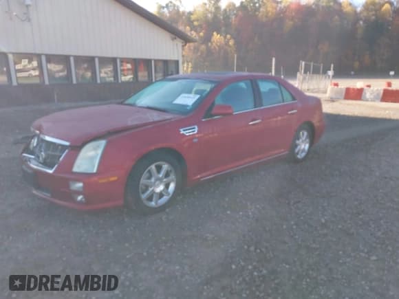 ✅ 2010 Cadillac STS AWD • VIN: 1G6DU6EVXA0136265 • Lot: 43600649. Listed on IAAI with 98,545 mi. Free auction sales archive from the USA and detailed vehicle history report at DreamBid. Image 18.
