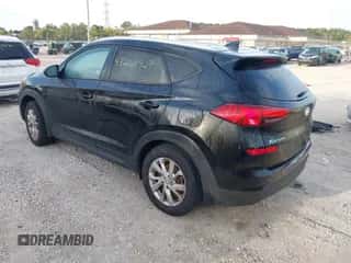 ✅ 2019 Hyundai Tucson Value • VIN: KM8J3CA45KU989161 • Лот: 43268929. Размещён на IAAI с пробегом 84 309 миль миль. Получите бесплатный доступ к архиву аукционных продаж из США и посмотрите подробный отчёт об истории автомобиля на DreamBid. Изображение 3.